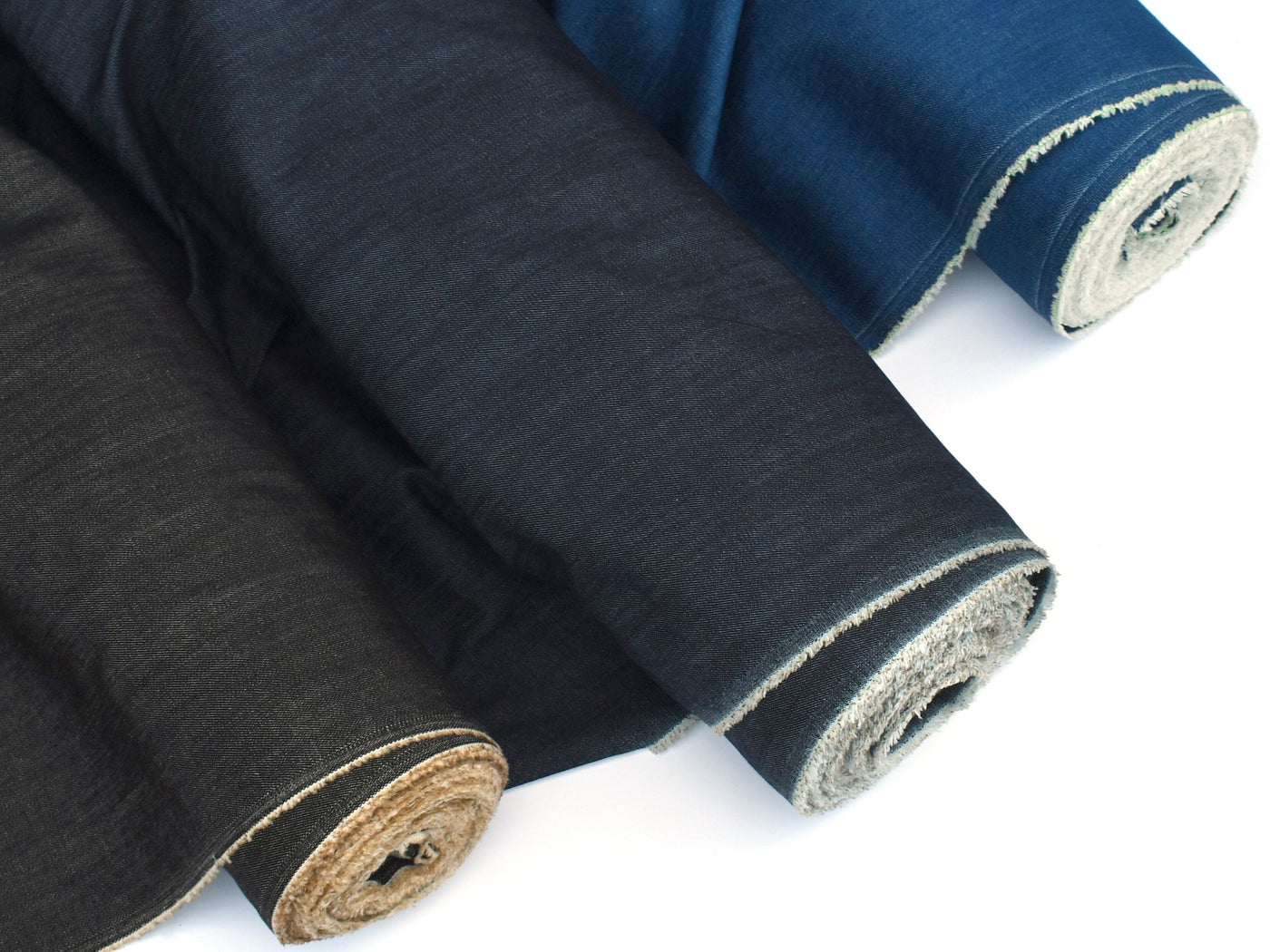 Fabrics & Textiles template hero — folded premium indigo denim
