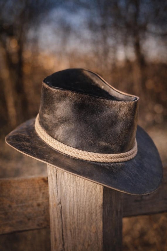 Distressed leather cowboy with concho band
